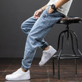 Men's straight leg cargo jeans in cotton with Korean style skinny opening