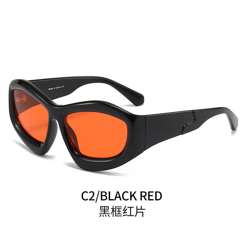 Concave shape sunglasses with bubble lens in multiple colour combinations including black, blue, red and yellow.