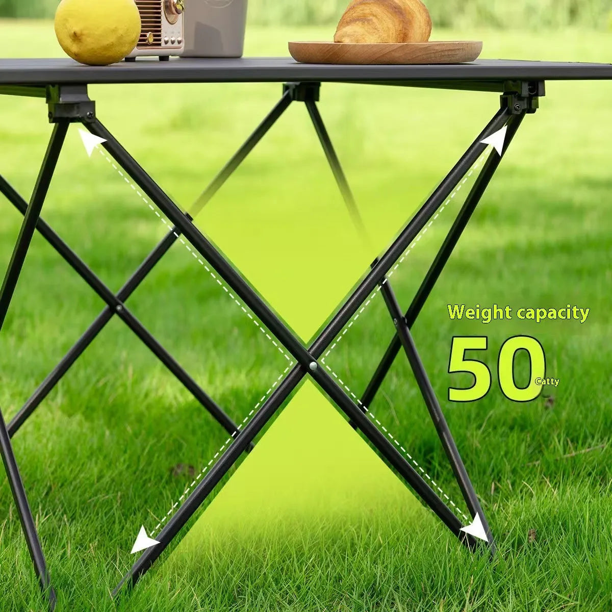 Ultralight aluminium alloy folding table in black carbon steel finish, folded flat for storage