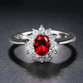 Electroplated copper women's ring with flower design and inlaid zirconium stones in three colour options.