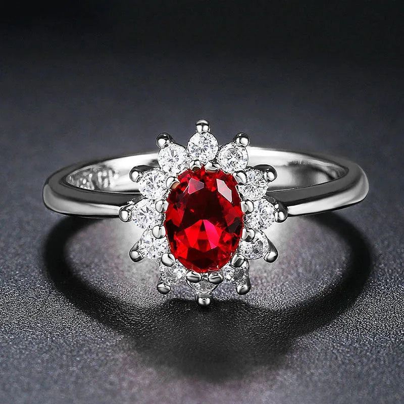Electroplated copper women's ring with flower design and inlaid zirconium stones in three colour options.