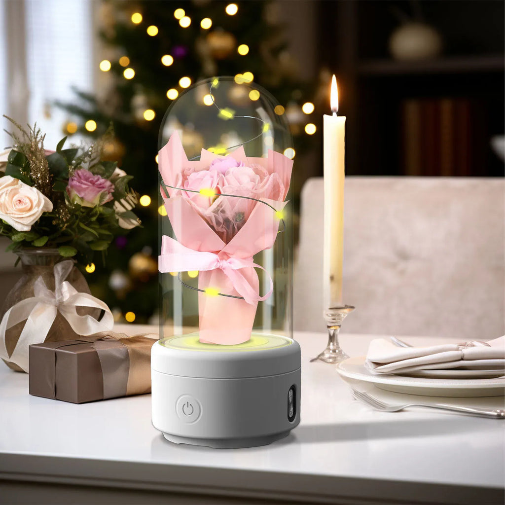 LED bouquet night light with Bluetooth speaker inside a glass cover on a black base.
