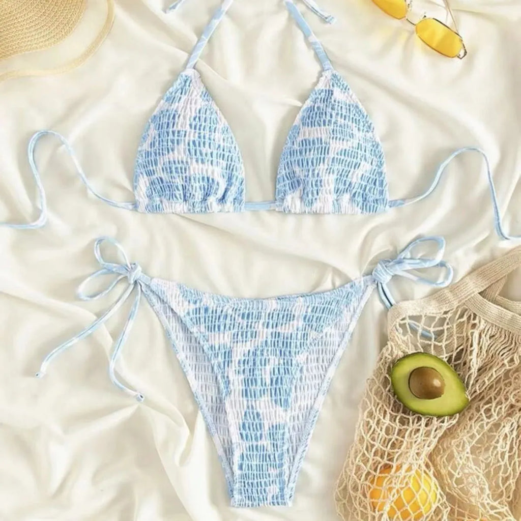 Women's floral print halter swimsuit set in light blue colour with briefs style
