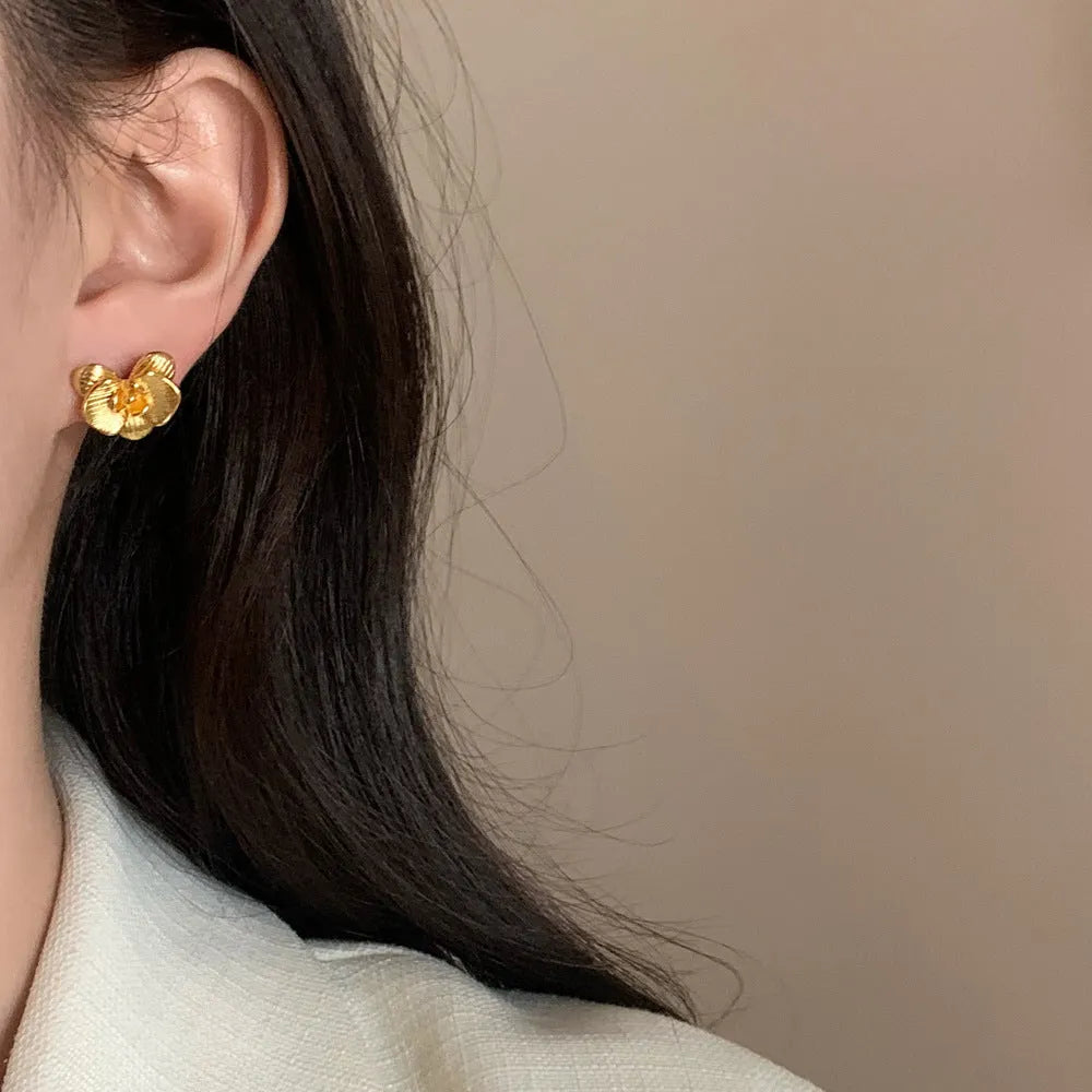 Retro flower earrings with petal design in gold and silver electroplated finishes