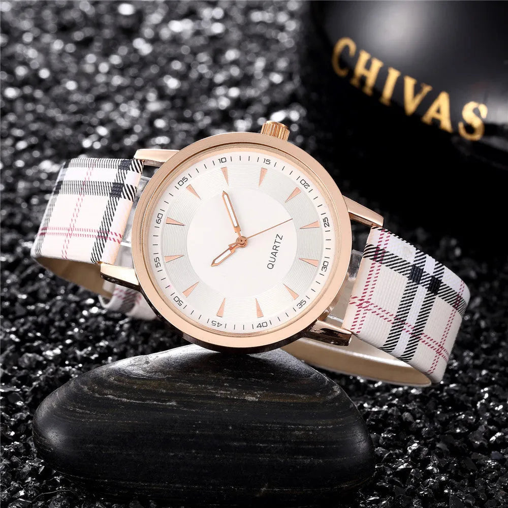 Women's fashion belt watch with round dial, leather strap, gold black colour, stainless steel case