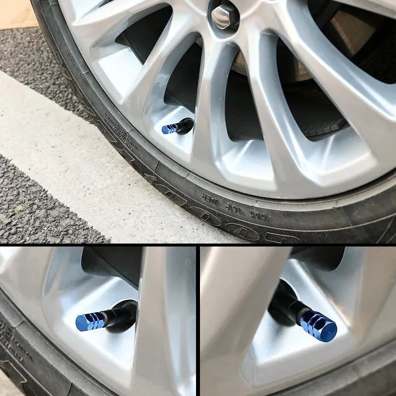 Set of ten aluminium alloy car valve caps in blue, red, silver, gold and black on a white background