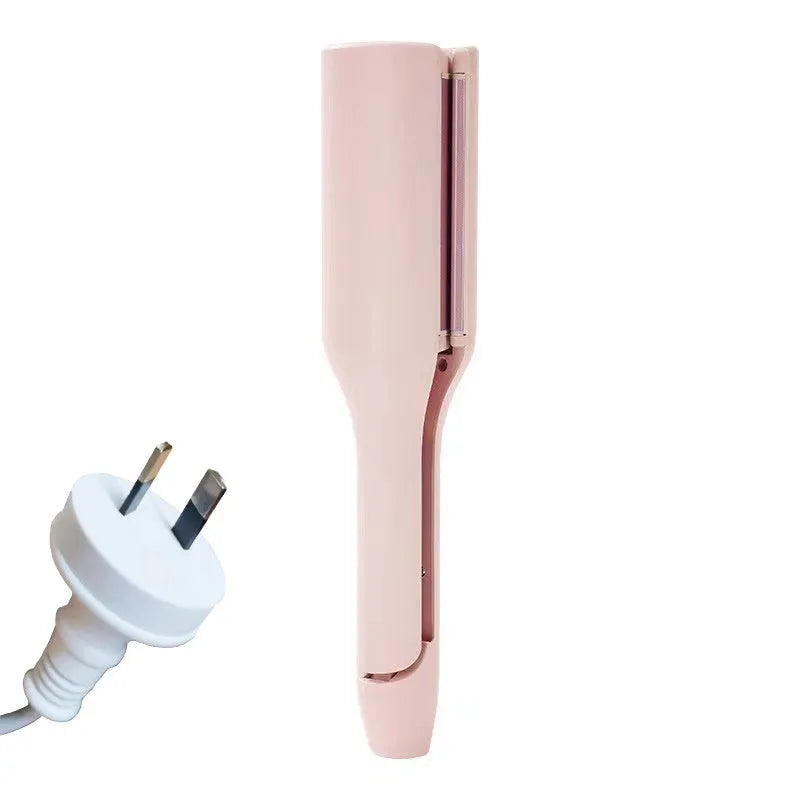 32mm pink hair curling iron with ceramic barrel and 4 heat settings on white background