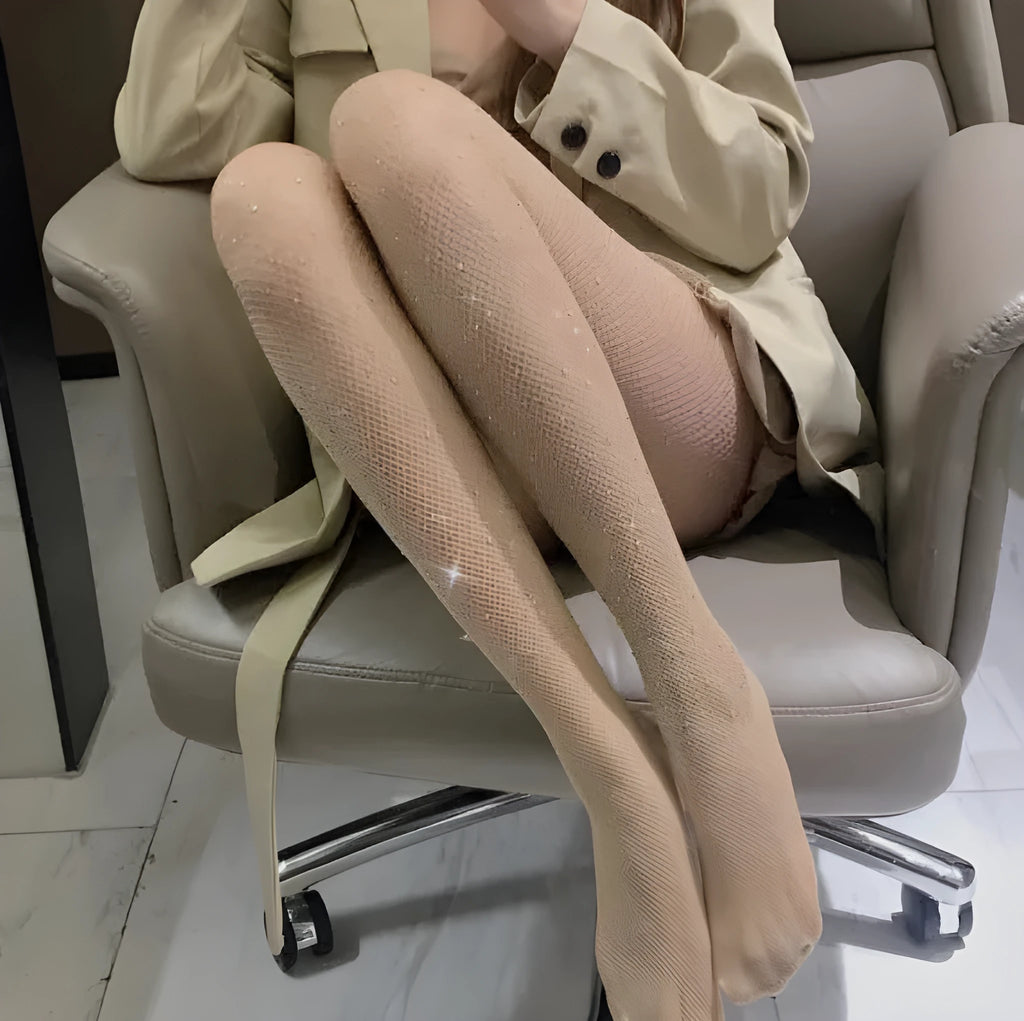 Pair of women's thin nylon fishnet stockings with a diamond mesh pattern in a neutral colour.