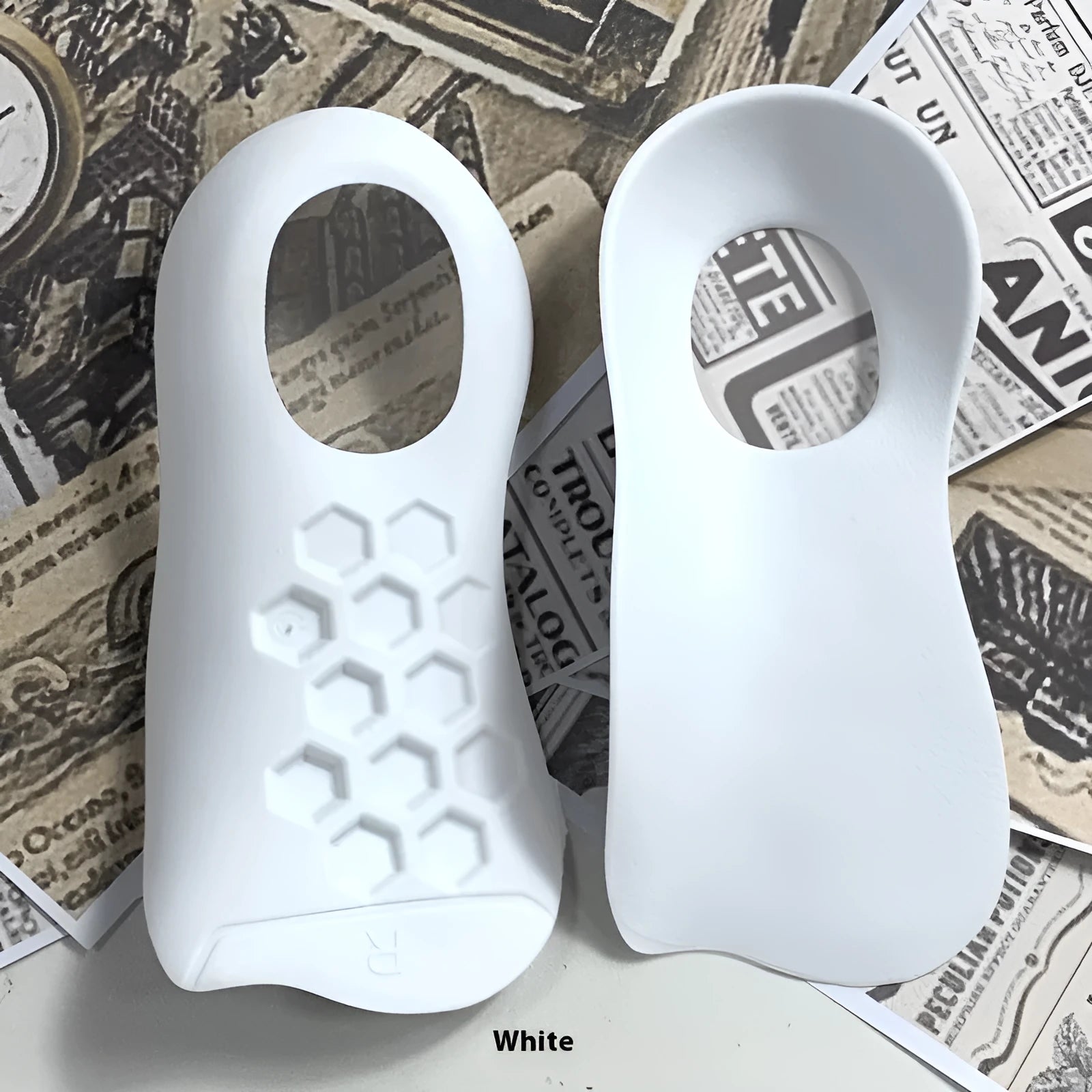 TPR arch support varus correction insole in white, black, or skin colour for sizes 35-45.