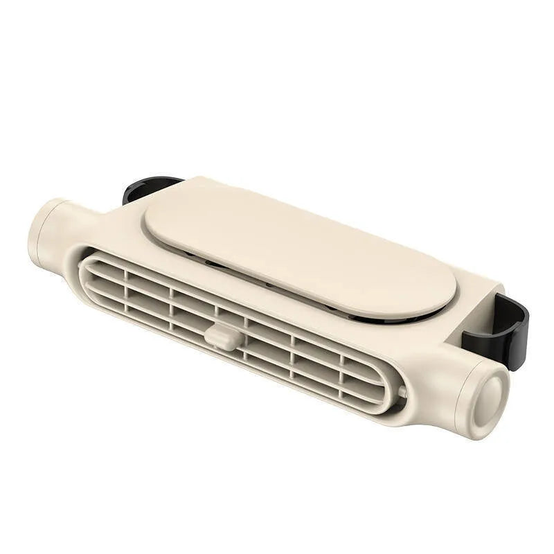 USB car fan with velcro strap mounted on a car seat headrest, showing its brushless motor and bladeless design.