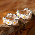 White daisy flower ring earrings with electroplated finish and platinum gem detailing