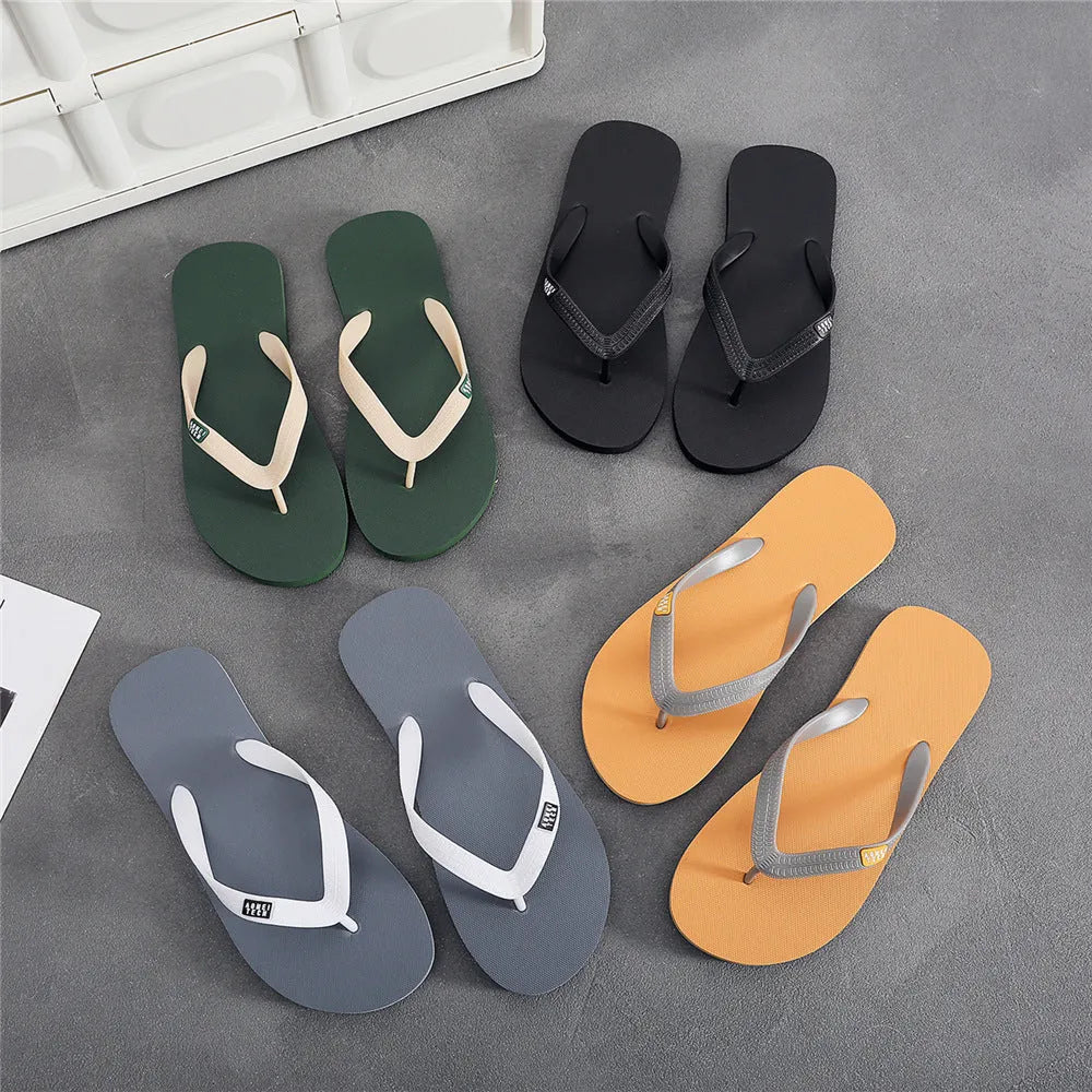 Men's black flip-flop with textured non-slip rubber sole and lightweight EVA upper strap.