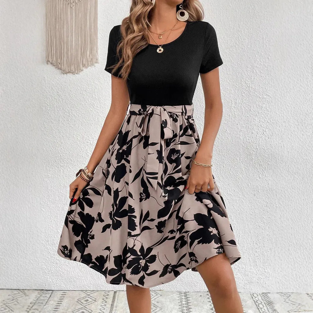 Khaki women's A-line dress with floral print and lace-up detail on the shoulder strap.