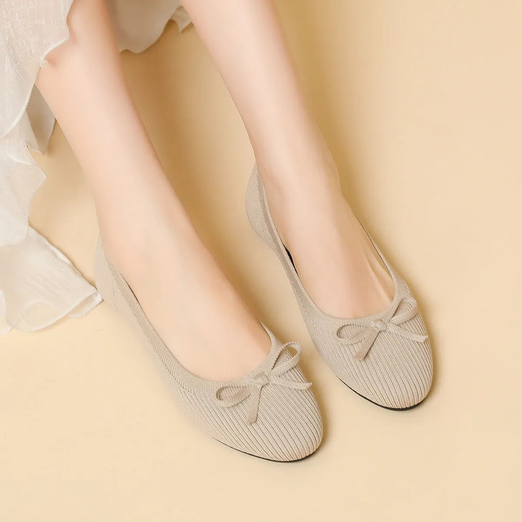 Women's round toe fabric flat pumps with bow decoration in butterfly black colour