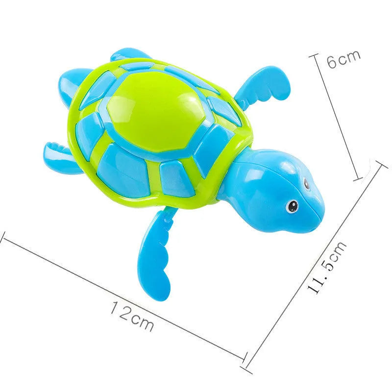 Plastic baby tortoise bath toy floating in water for bath time play