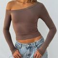 Women's slim-fit long-sleeve knitted cardigan in black, brown, and red colour options.
