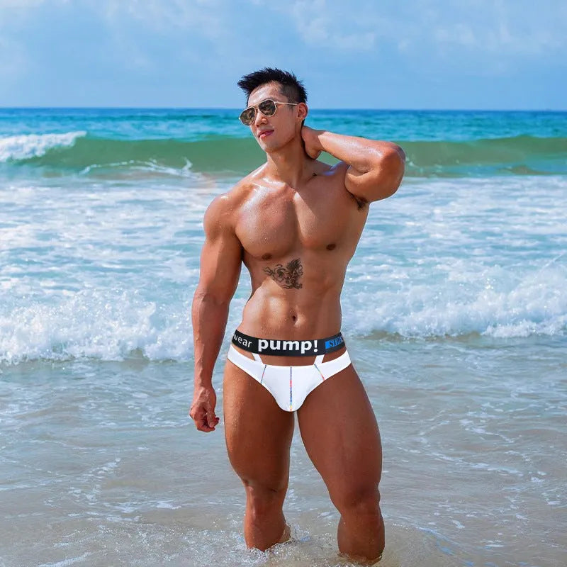 Men's solid black modal low waist briefs laid flat, showing the briefs style.