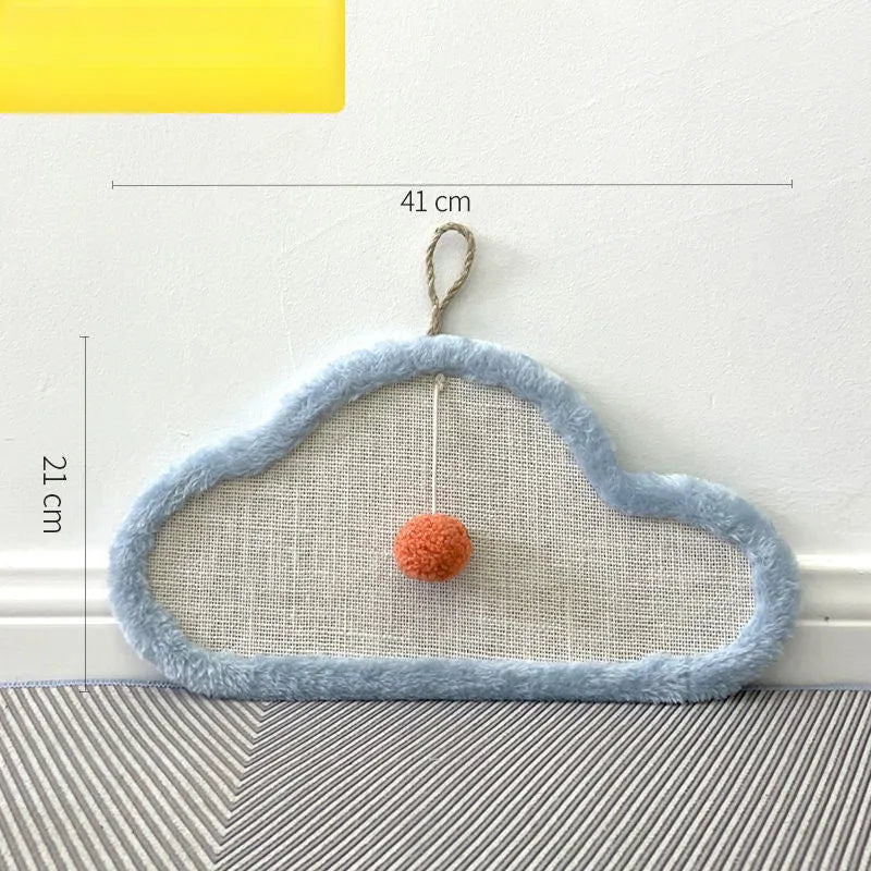 White cat scratching mat with sleeping cat pattern hanging on wall