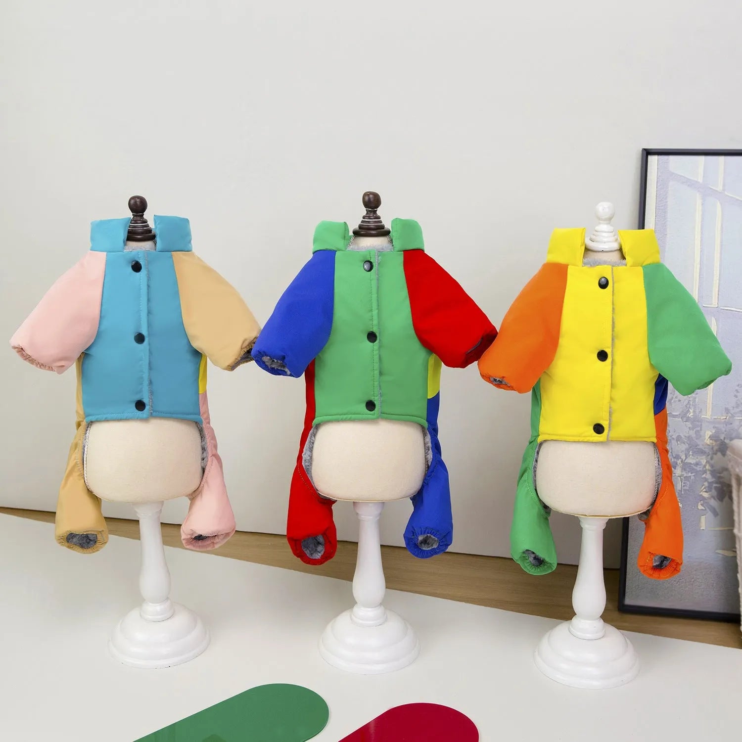 Pet dog winter warm thickened four-leg cotton-padded polyester coat, blue collar, side view on background