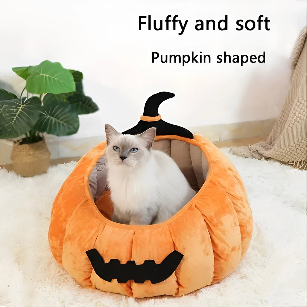 Halloween pumpkin-shaped cat bed with cartoon devil design in soft plush material