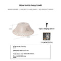 Beige and grey wine bottle shaped USB-C rechargeable camping lantern with three light modes.