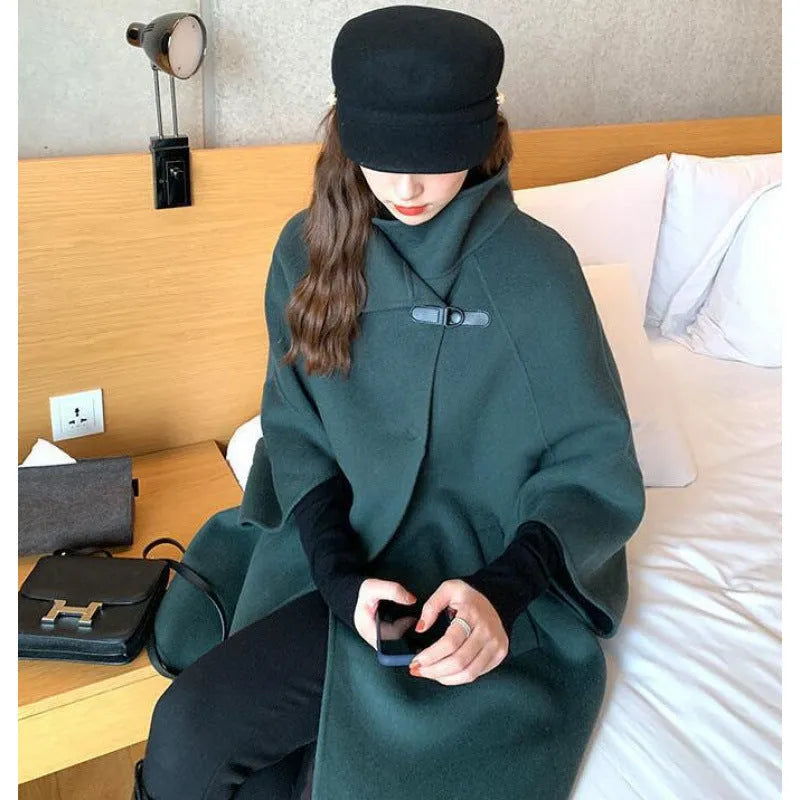 Women's oatmeal coloured acrylic coat with flight sleeves showing 100cm length