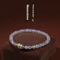 Moonstone bracelet with animal zodiac motif in national style design featuring blue light elements