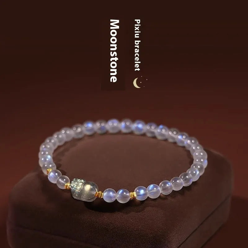 Moonstone bracelet with animal zodiac motif in national style design featuring blue light elements