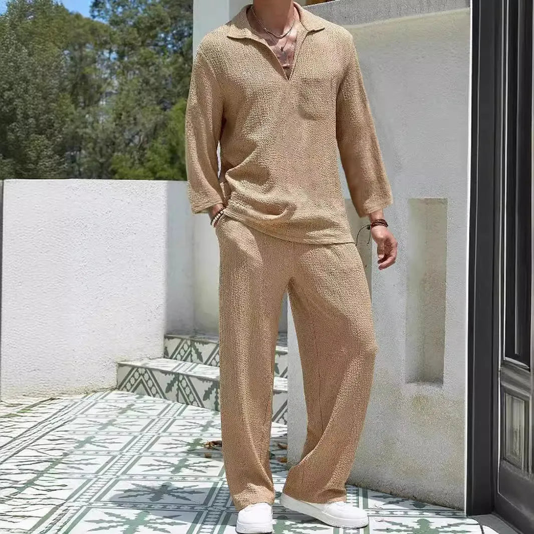 Men's casual polyester commuter suit in lake blue, showing shirt jacket and trousers laid flat.