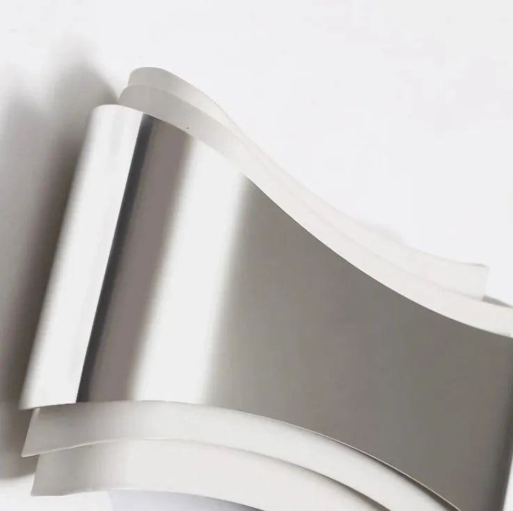 Simple modern warm white LED wall lamp with matte finish and compact rectangular design.