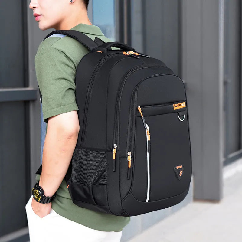 Men's Oxford cloth schoolbag in black with letter pattern showing air pillow belt and large capacity design