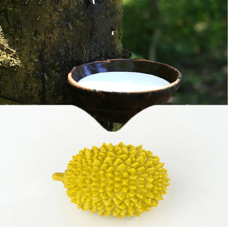 Beige, green, and yellow durian-shaped dog chew toy with raised bristles for teeth cleaning.