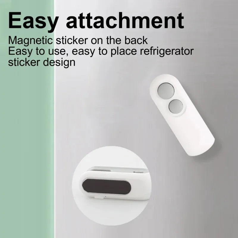 White handheld vacuum sealing machine with USB charging port and magnetic back for chip bags
