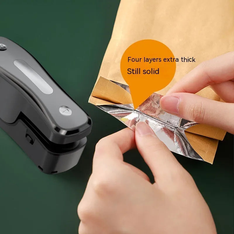 Milky white portable USB sealing machine with magnetic patch for kitchen food preservation