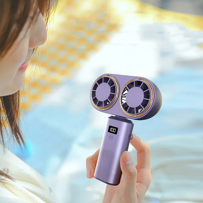 USB rechargeable handheld fan folded showing digital display screen and available in three colours