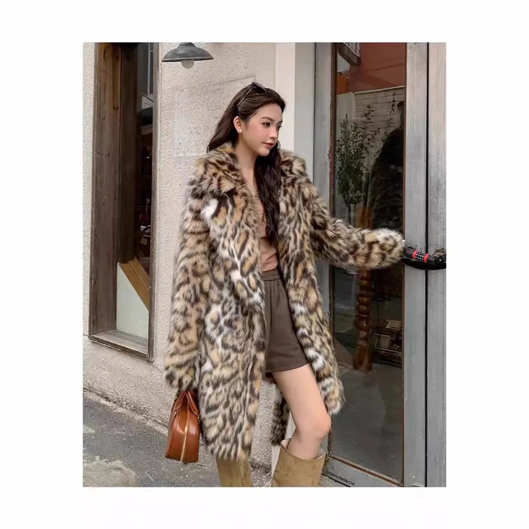 A woman's long faux fur coat with a fur collar and pockets, shown in a street fashion style.