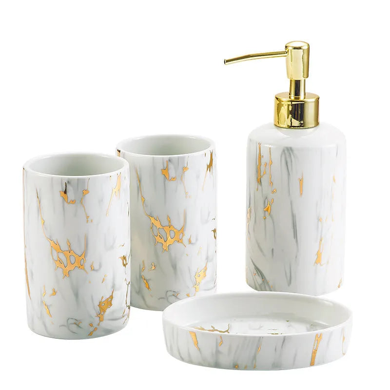 White ceramic bathroom wash kit set with two cups, a soap dish, and a bottle in a presentation box.