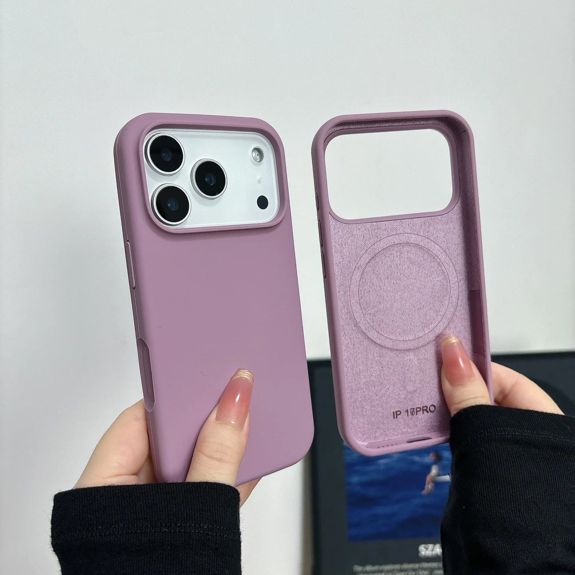 Magnetic liquid silicone iPhone case with Ai button for iPhone 12, 13, 14 models in antique white colour.