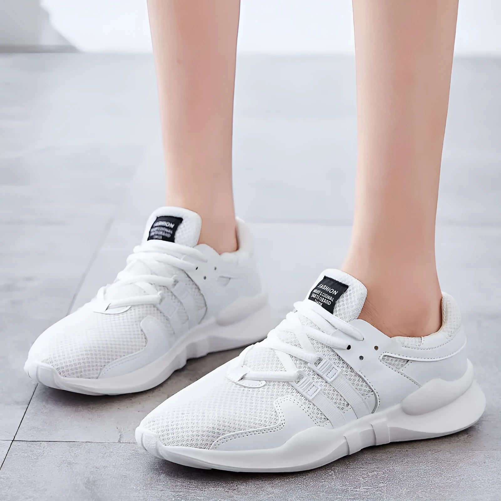 Breathable hollow-out casual sneaker in mesh construction with round toe and low-top design