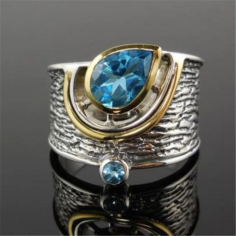 Blue Chinese style zircon ring with drop shape setting on alloy band