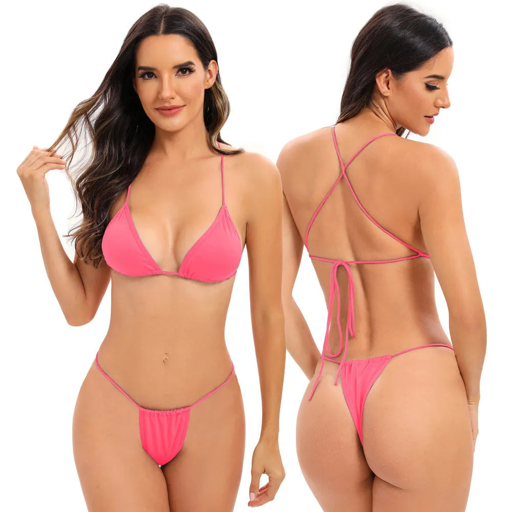 Women's candy coloured cross strap split swimsuit with adjustable multiple straps in striped spandex fabric.