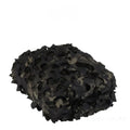 Green and brown camouflage pattern netting draped to create sunshade and visual cover.