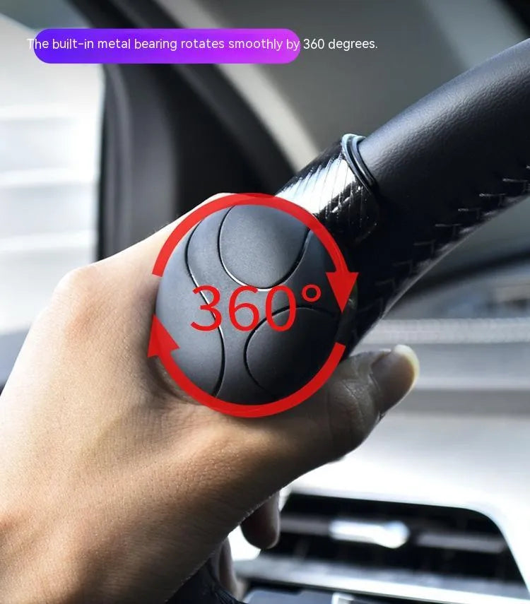 Steering wheel assist ball with silicone construction and metal bearing booster for single-hand driving