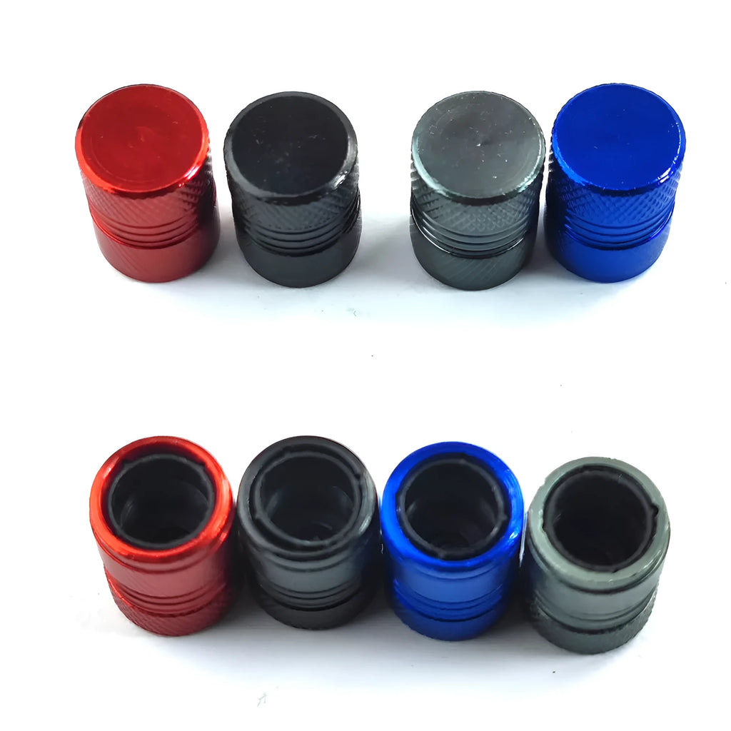 Aluminium car tyre valve dust cap in black, blue, grey, and red colours.