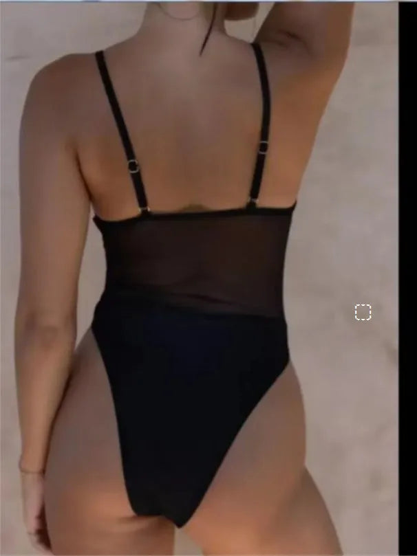 Women's black one-piece swimsuit with banded bikini design and sleeveless construction