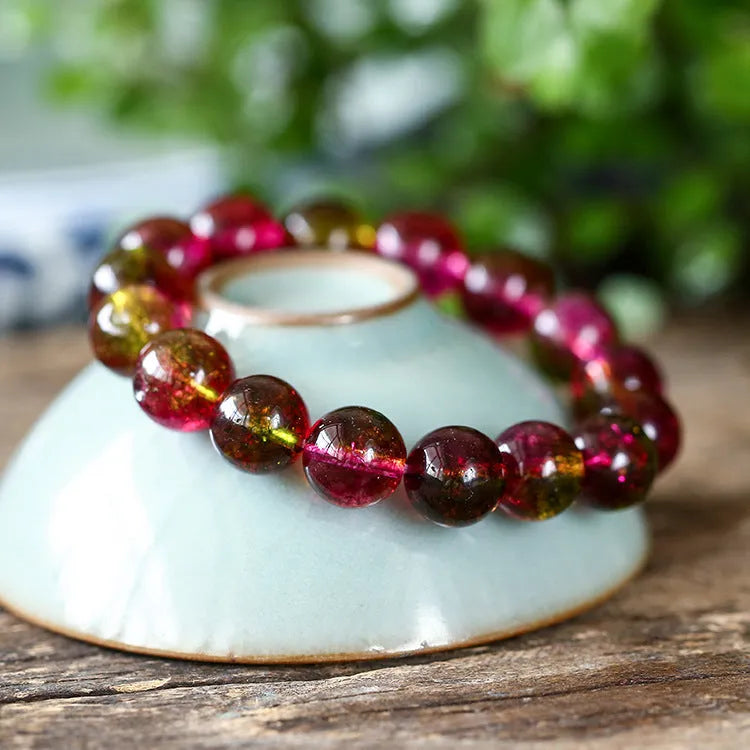 Women's handcrafted watermelon crystal bracelet showing four bead size options from 6mm to 12mm