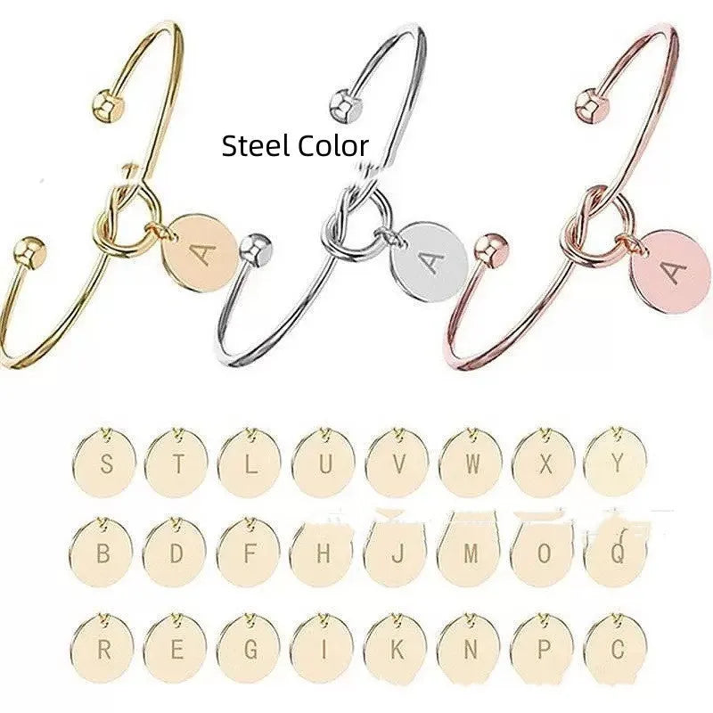 Titanium steel DIY love heart bracelet with electroplated finish showing letter wafer option