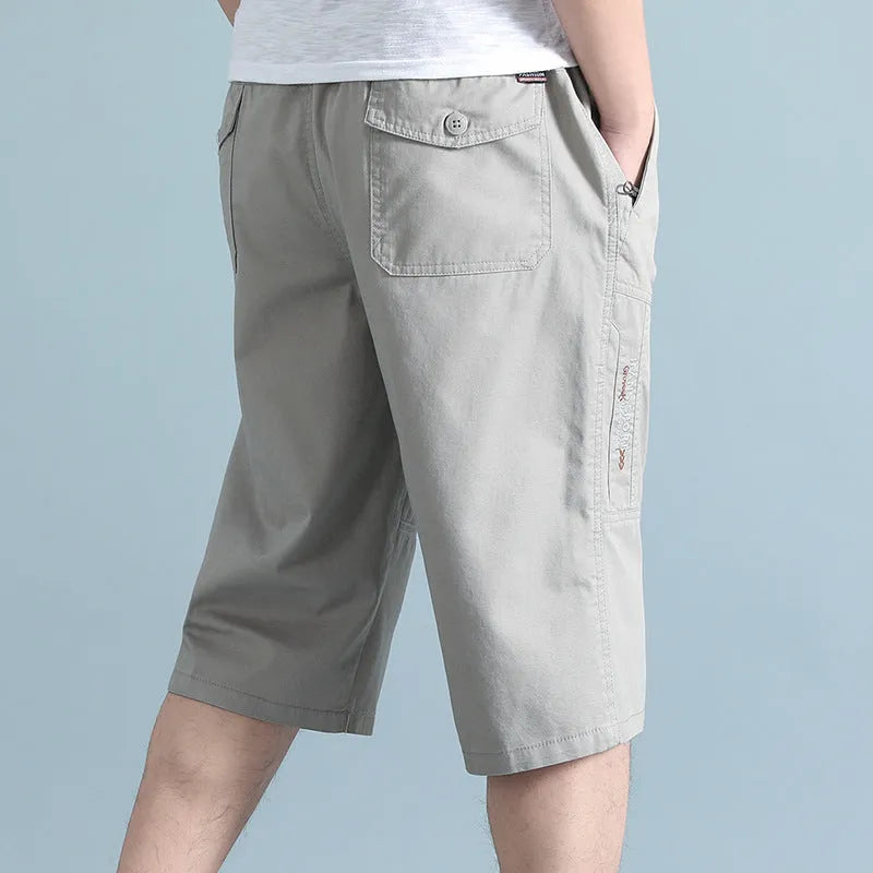 Men's loose cotton sports pants in straight-leg cropped design for summer wear