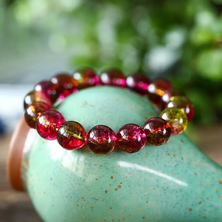 Women's handcrafted watermelon crystal bracelet showing four bead size options from 6mm to 12mm
