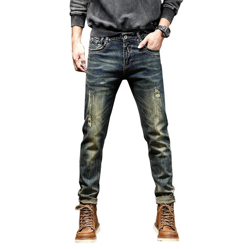 Men's retro blue jeans with stretch fabric in skinny fit style showing zip fly detail